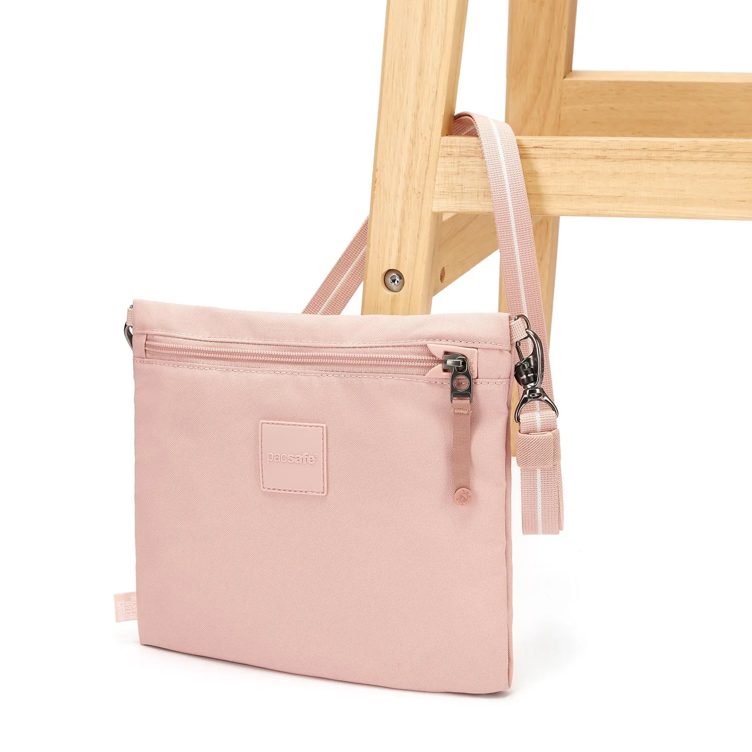 Pacsafe Go Anti-Theft Crossbody Pouch (Sunset Pink)